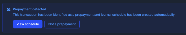 Banner on a transaction explaining that it has been identified as a prepayment and a journal schedule has been created automatically, with “View schedule” and “Not a prepayment” buttons